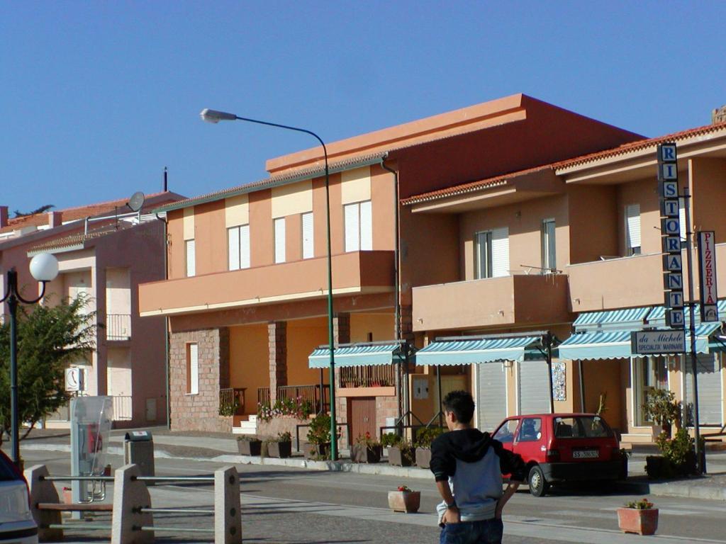 Borgo Spiaggia Vista Mare Isola Rossa Camera foto